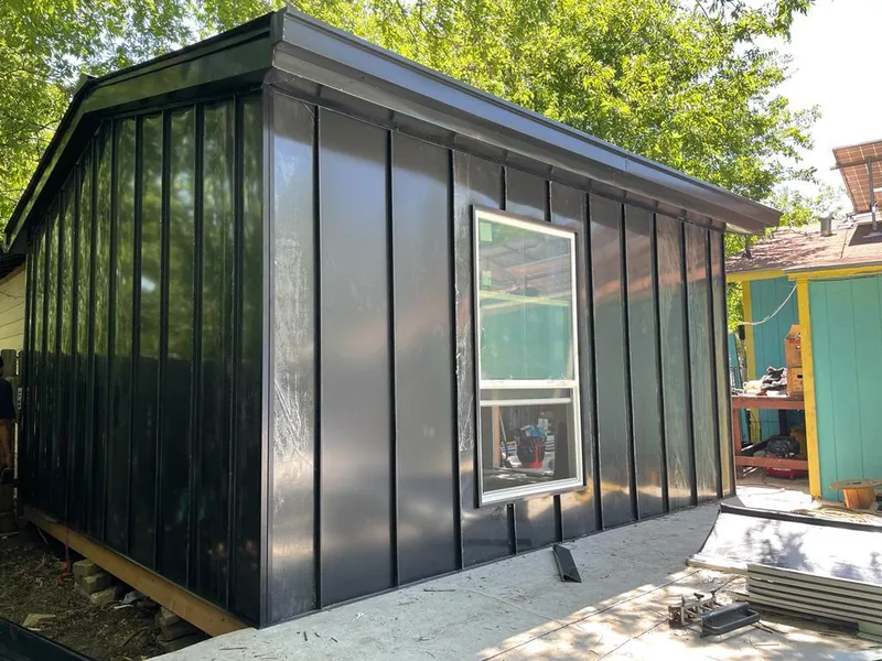 Black standing seam metal wall panels for Roof Inspection in Sumner