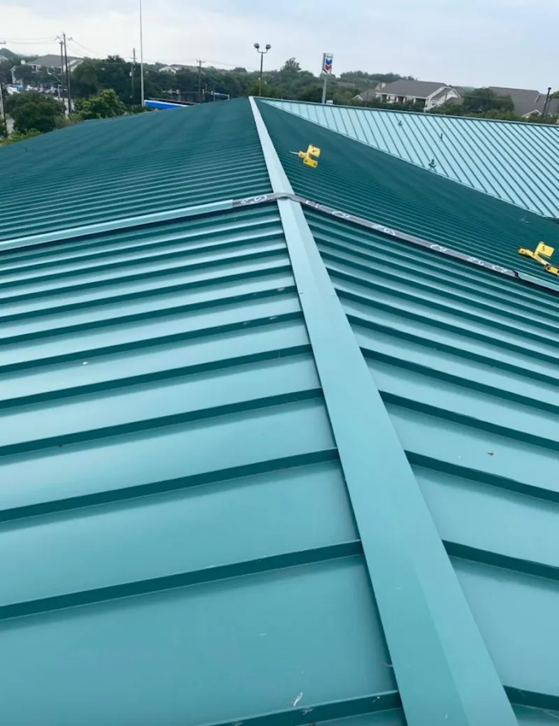 Green commercial metal roof ridge and valley for Metal Roof Repair in Sumner