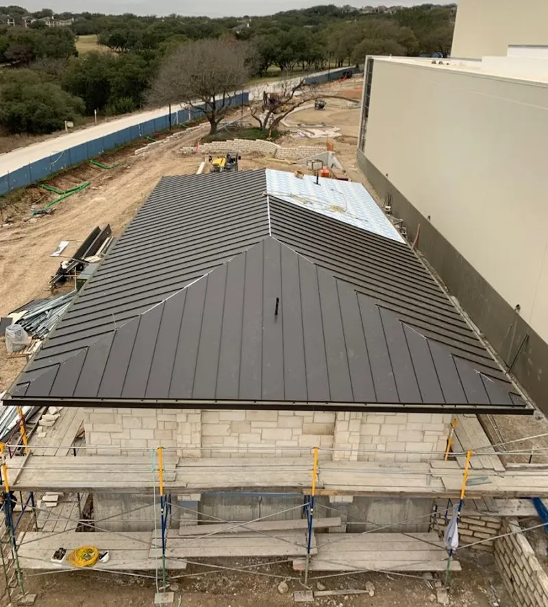 Metal roof new construction with scaffolding in Sumner